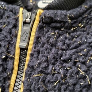 Nike Black Sherpa Jacket with Gold Trim and Branded Zipper